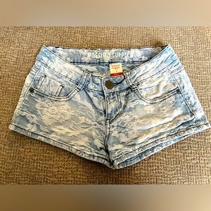 Light blue floral print shorts.